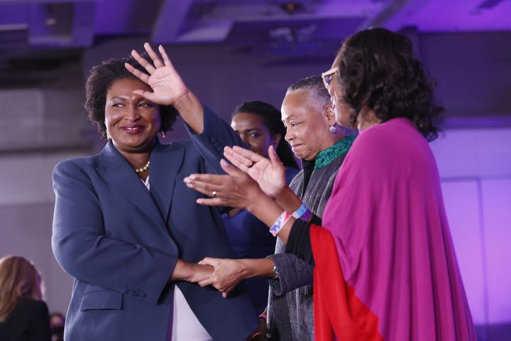 Stacey Abrams waves to the crowd after giving her speech during the election night watch party. Abrams has conceded; she called governor Bryan Kemp to congratulate him.
Miguel Martinez / miguel.martinezjimenez@ajc.com