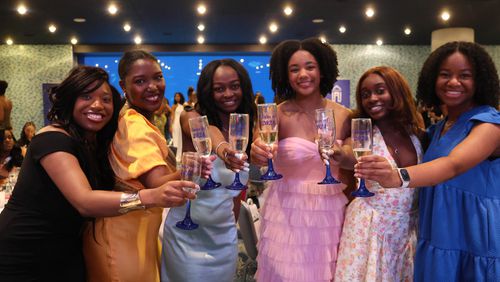 Spelman College seniors celebrate their upcoming commencement at an afternoon party at the Georgia Aquarium. Contributed photo.
