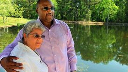 David Moody Jr. and his wife of more than 30 years, Karla, relax by the pond at their Lithonia home. “I was shocked,” Karla said about hearing about the sexual abuse her husband suffered as a 10-year-old. “And as a nurse, my shock meter is a bit high.” AJC FILE PHOTO