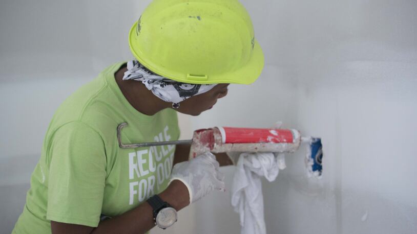 Rashawn Medley puts in “sweat equity” at her Habitat for Humanity home. The home is scheduled to be complete in early August. Contributed