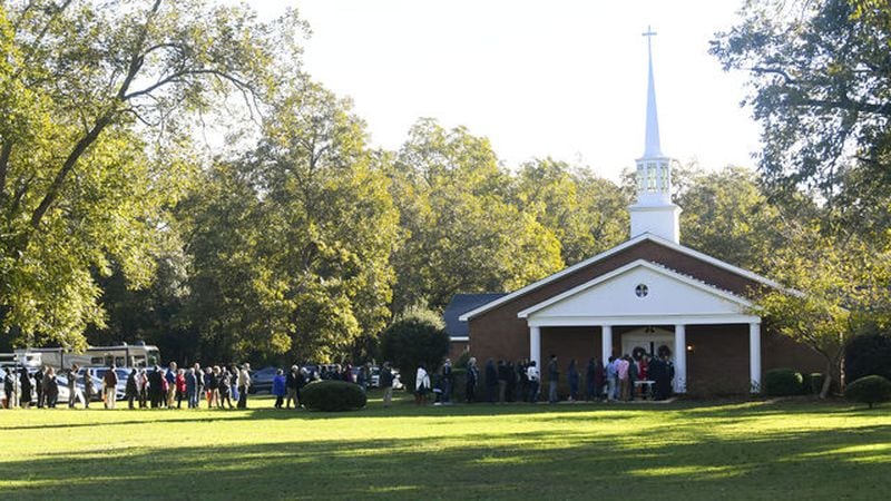 Guests line up to attend Sunday school — and to meet Jimmy and Rosalynn Carter — at Maranatha Baptist Church, in Plains in 2019. (AP Photo/John Amis)