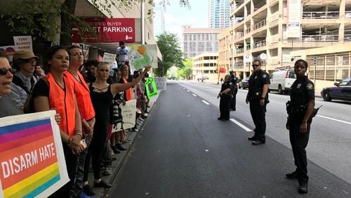 Police were present at a Trump protest outside of a downtown fundraiser for Karen Handel.