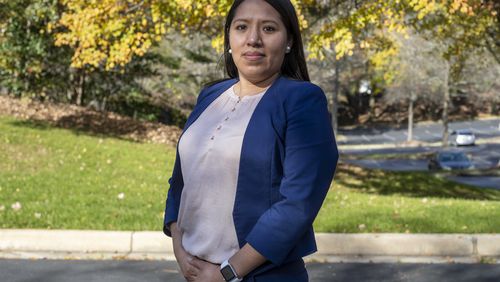 11/24/2020 �  Atlanta, Georgia � Jessica Colotl stands for a portrait outside of her employers office in Sandy Springs, Tuesday, November 24, 2020. Colotl has worked as an immigration paralegal for more than 4 years. (Alyssa Pointer / Alyssa.Pointer@ajc.com)