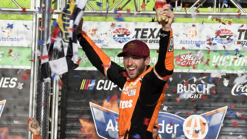 Chase Elliott celebrates his win in a NASCAR Cup Series auto race at Texas Motor Speedway in Fort Worth, Texas, Sunday, April 14, 2024. (AP Photo/Randy Holt)