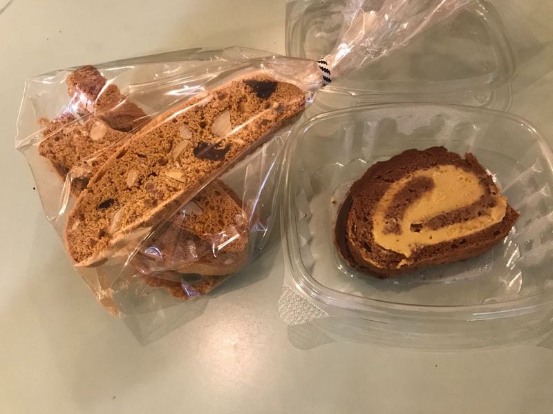 Huh! Natural and Real Food offers baked goods such as biscotti (left) and desserts like slices of a chocolate cake roll with a cream filling flavored by a Peruvian fruit known as lucuma. LIGAYA FIGUERAS/LIGAYA.FIGUERAS@AJC.COM