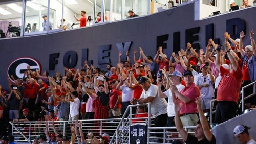 UGA Bulldogs fans react after UGA Bulldogs shortstop Kolby Branch (9) hit a solo home run in the top of the ninth inning to tie the game against Ga Tech during the NCAA Tournament Regional at Foley Field on Sunday, June 2, 2024, in Athens.
(Miguel Martinez / AJC)