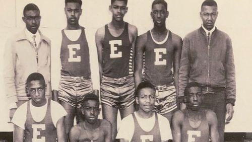 Eatonton Colored High School's basketball team from the 1949-50 GIA season. Pictured are (front row, from left) Herbert Stokes, J.W. Freeman, Frederick Griffith, Charles Freeman and (back row, from left) coach Odell Owens, Willie Frank Daniel, James Few, Roy Little and Principal W.N. McGlockton. Charles Freeman, now 91, is among the former GIA athletes interviewed in the GPB documentary "As If We Were Ghosts," which will air Monday and Thursday.