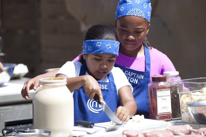 Eleven-year-old Gwinnett County student Justise Mayberry slices and dices during an episode of MasterChef Junior. Photo Credit: Fox