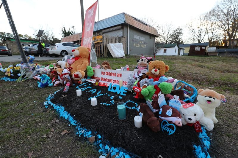 013122 Atlanta: A memorial for 6-month-old Grayson Fleming-Gray is seen outside the Food Mart where he was shot and killed last week in a drive-by shooting on Monday, Jan. 30, 2022, in Atlanta.   “Curtis Compton / Curtis.Compton@ajc.com”`
