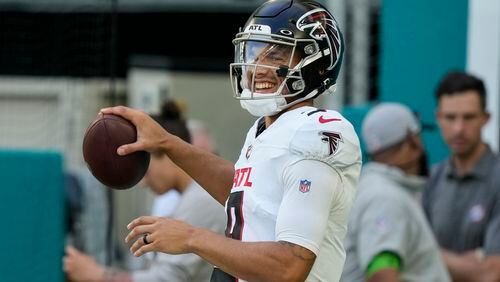 Falcons quarterback Desmond Ridder warms up before a game against the Miami Dolphins, Friday, Aug. 11, 2023, in Miami Gardens, Fla. (AP Photo/Marta Lavandier)