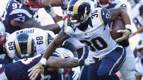 Todd Gurley of the Los Angeles Rams runs with the ball during the first half against the New England Patriots at Gillette Stadium on December 4, 2016 in Foxboro, Massachusetts. (Photo by Maddie Meyer/Getty Images)