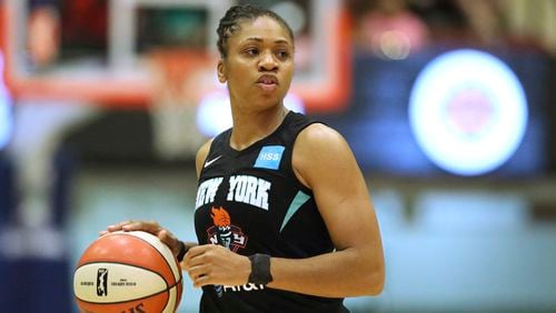 New York Liberty's Tanisha Wright plays against the Los Angeles Sparks during a WNBA game Saturday, July 20, 2019, in White Plains, N.Y. The Atlanta Dream hired longtime WNBA player Tanisha Wright as its new head coach on Tuesday, Oct. 12, 2021, looking to bring stability to a team that struggled under two interim coaches this past season. The 37-year-old Wright played 14 seasons with the Seattle Storm, New York Liberty and Minnesota Lynx. (Gregory Payan/AP)