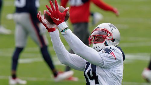 New England Patriots wide receiver Mohamed Sanu Sr. catches a pass during an NFL football training camp practice, Monday, Aug. 17, 2020, in Foxborough, Mass. (AP Photo/Steven Senne, Pool)