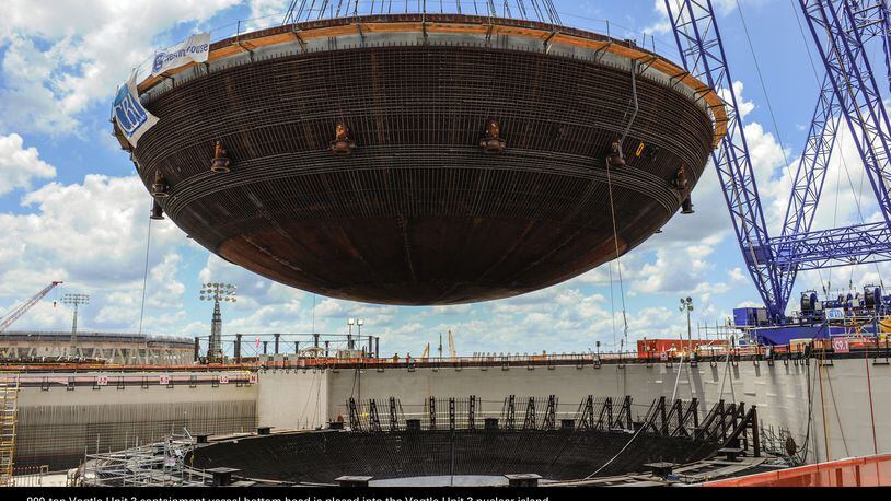 The head of Georgia’s utility regulator said Plant Vogtle’s expansion will cost more “time and money” if its key construction contractor files for bankruptcy. Here, a containment vessel is installed in 2013. Photo: Georgia Power.