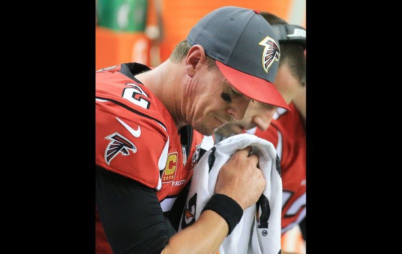 Falcons quarterback Matt Ryan reacts on the bench after throwing an interception to the Vikings in the endzone during the third quarter in a football game on Sunday, Nov. 29, 2015, in Atlanta. Curtis Compton