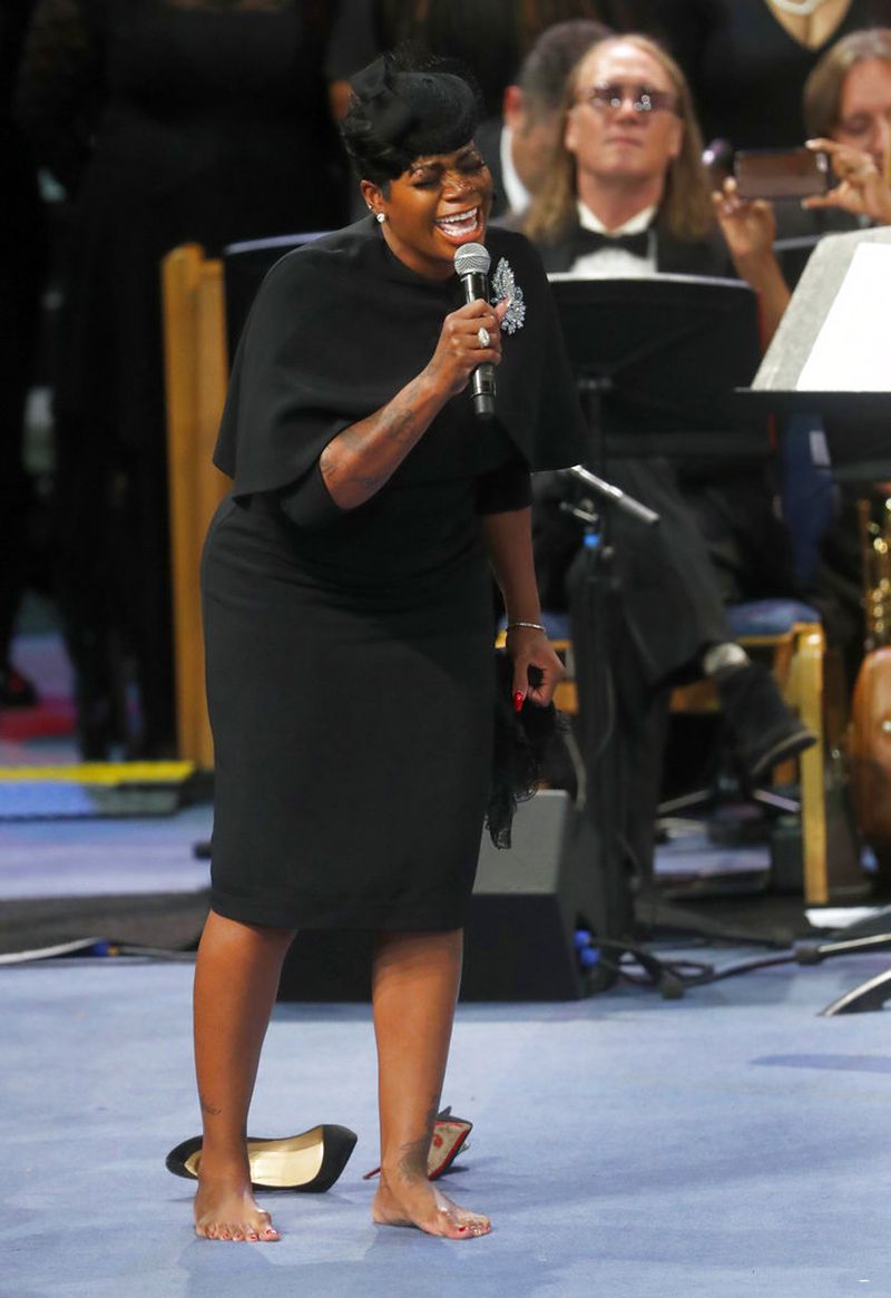 Fantasia Barrino-Taylor performs during the memorial service for Aretha Franklin at the Greater Grace Temple on Friday, August 31, 2018 in Detroit.  Franklin died of pancreatic cancer on August 16, 2018, at the age of 76.  (AP Photo / Paul Sancya)