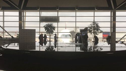A350 inaugural flight through the airport window. Source: Delta Air Lines.