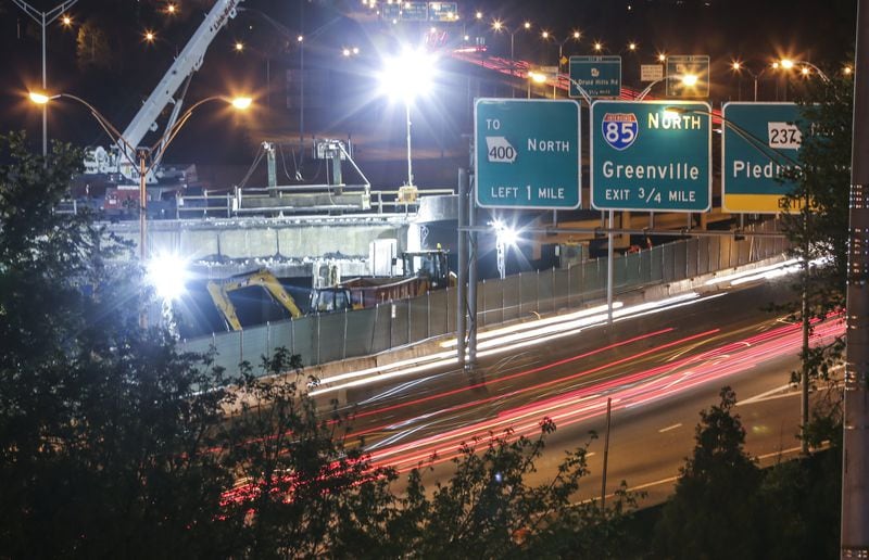 Crews are working around the clock to repair the section of I-85 that collapsed during a massive fire March 30. (Photo: JOHN SPINK /JSPINK@AJC.COM)
