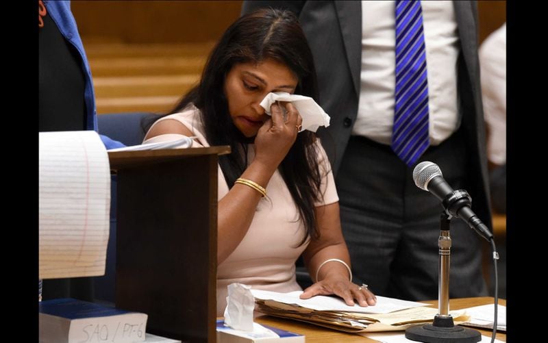 Parneeta Sidhu, wipes away tears during statement at the sentencing of Lishan Wang at New Haven Superior Court Friday, Sept. 22, 2017, in New Haven, Connecticut. Wang is the man who killed her husband.