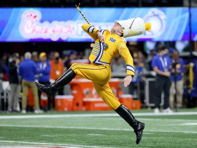 Pittsburgh Panthers drum major performs before the Chick-fil-A Peach Bowl between the Pittsburgh Panthers and the Michigan State Spartans at Mercedes-Benz Stadium in Atlanta, Thursday, December 30, 2021. JASON GETZ FOR THE ATLANTA JOURNAL-CONSTITUTION