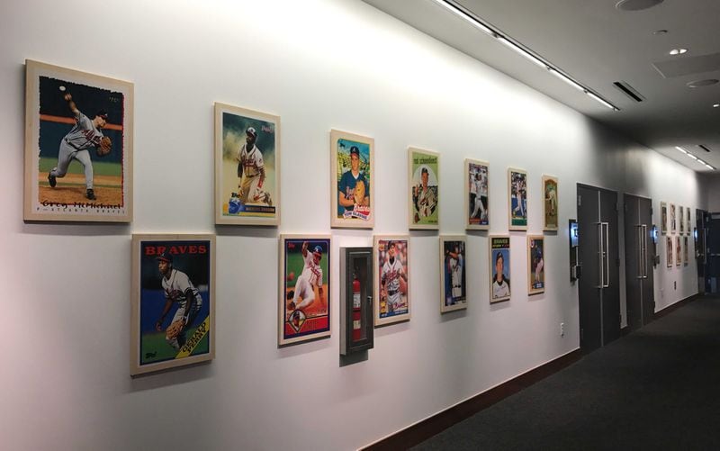 Seventy oversized vintage Topps baseball cards dating back to the 1950s printed on wood will be displayed in the Konica Minolta Conference Center.