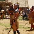 Ryker Sixkiller, center foreground, portrays a Cherokee athlete playing stickball in the Marvel “Echo” television series. The stuntman is proud the acting gig allowed him to travel to the elaborate film set in Georgia and help bring to the screen a sport his Cherokee ancestors played here. Sixkiller didn’t have to pretend, as he competes for two stickball teams back home in Oklahoma. Photo courtesy of Ryker Sixkiller.