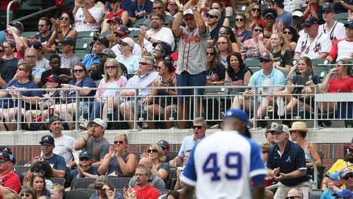 Braves fans applaud Julio Teheran as walks off the field at SunTrust Park last month.
