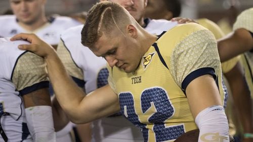 Georgia Tech punter Grant Aasen, who overcame a life-threatening head injury in high school when he was a running back, decided to skip his final season of eligibility to attend seminary school with the intent to be a priest. (Photo by Danny Karnik / Georgia Tech)
