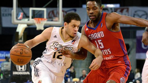In a file photo, Erie BayHawks’ Seth Curry tries to get past Grand Rapids Drive’s Kelsey Barlow during an NBA D League basketball game Saturday, Jan. 10, 2015, in Erie, Pa. (AP Photo/Erie Times-News, Jack Hanrahan)