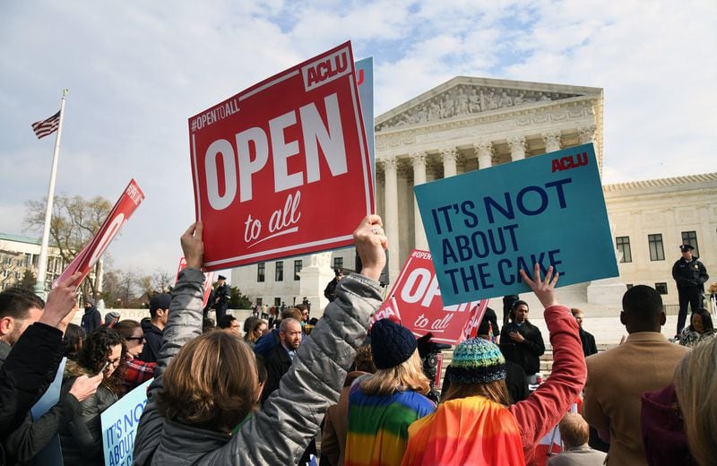 Protesters gather in front of the Supreme Court building last year on the day the court was scheduled to hear the case Masterpiece Cakeshop v. Colorado Civil Rights Commission in Washington, D.C. OLIVIER DOULIERY / ABACA PRESS / TNS