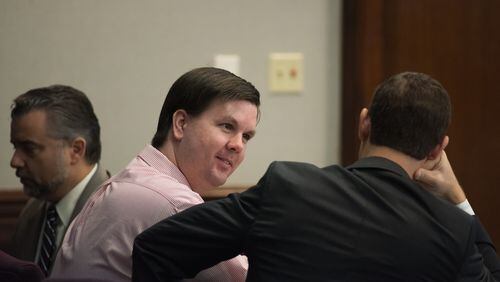 Defendant Justin Ross Harris sits with his defense team as they prepare to turn evidence over to the jurors for their deliberations at the Glynn County Courthouse in Brunswick, GA. Harris is charged with murder in the 2014 death of his toddler son Cooper.