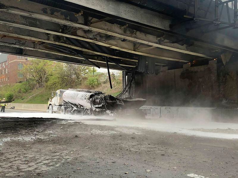 This image provided by the Norwalk Police Department shows the scene of a tanker fire on I-95 in Norwalk, Conn., Thursday, May 2, 2024. Both sides of I-95, the East Coast's main north-south highway, were shut down — causing “horrendous” traffic jams — following the early morning crash involving a passenger car, a tractor-trailer and a tanker truck carrying 8,500 gallons (about 32,000 liters) of gasoline. (Norwalk Police Department via AP)