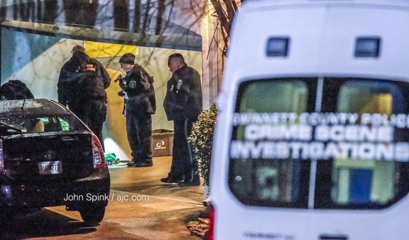 Gwinnett County police are investigating after they said a man shot an intruder outside his home on Mayfield Farms Drive. JOHN SPINK / JSPINK@AJC.COM