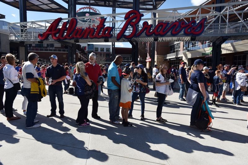 MARCH 31, 2017 ATLANTA Fans wait for the opening of the ballpark as the Atlanta Braves take the field in an exhibition game against the New York Yankees in the first game in the new SunTrust Park stadium Friday, March 31, 2017. The new home of the Braves seats 41,149 and took 30 months to build. HYOSUB SHIN /hshin@ajc.com