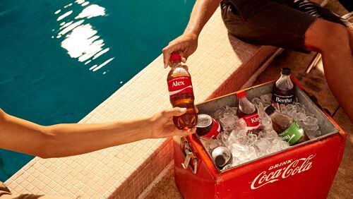 Coca-Cola said it is bringing back personalized pop bottles for a summer marketing campaign with last names and first names this year. Photo: Coca-Cola.