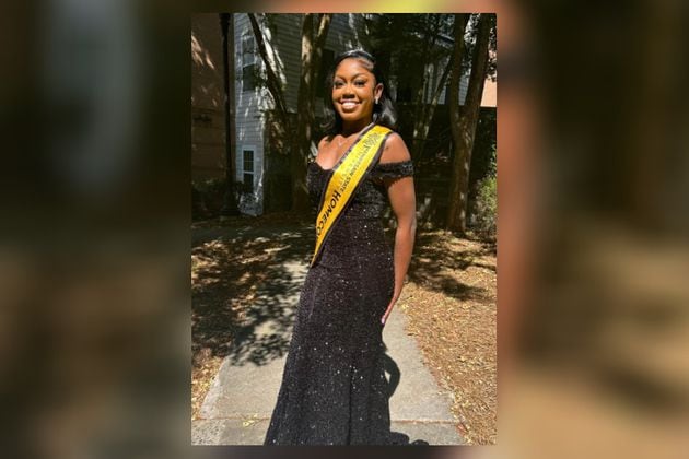 Alasia Franklin smiles while showing off her Kennesaw State homecoming sash in October.