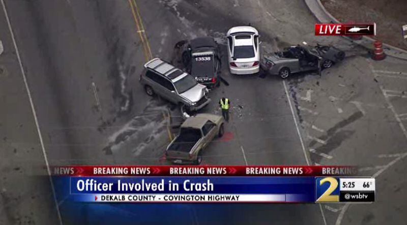 A wreck involving a patrol car shut down a DeKalb County intersection.