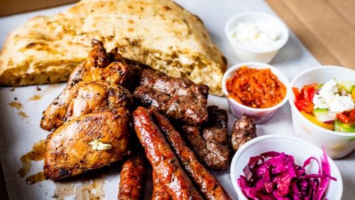 A familiar format — grilled meat, bread and toppings — sings with unique Balkan flavors during chef Adi Komic's Bosnian Grill Saturdays at Best End Brewing. Henri Hollis for The Atlanta Journal-Consititution