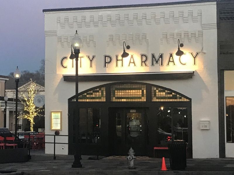 Housed in a 1920s building that was once a drug store, City Pharmacy is a new restaurant on the Covington town square. LIGAYA FIGUERAS / LFIGUERAS@AJC.COM