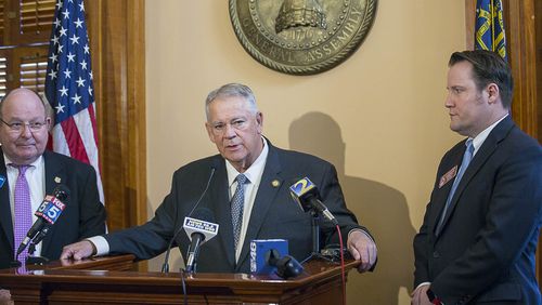 Georgia Speaker of the House David Ralston, center, stands with state Rep. Scott Holcomb, right, and Vernon Keenan, then the director of the Georgia Bureau of Investigation, during a press conference about the processing of rape kits and subsequent additional budget funding. (ALYSSA POINTER/ALYSSA.POINTER@AJC.COM)