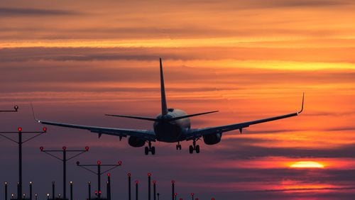 An airplane arrives at Hartsfield-Jackson Atlanta International Airport at sunrise, Thursday, March 24, 2016, in Atlanta. Following the Belgium bombings, U.S. cities and airports have raised security alerts. BRANDEN CAMP/SPECIAL