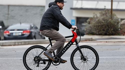 Jeff Beach takes his new electric bike from Edison Electric Bike Co. for a test ride on Thursday, December 22, 2022. (Natrice Miller/natrice.miller@ajc.com)