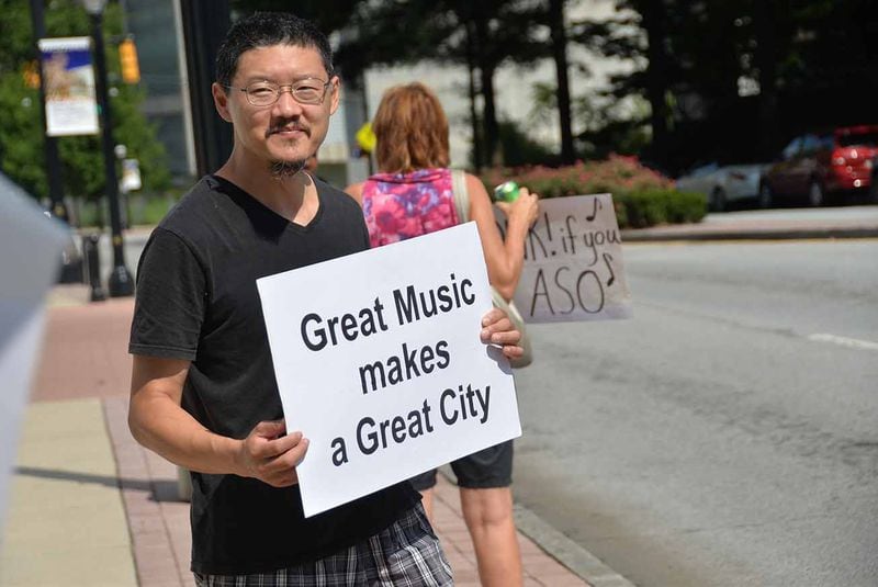 Musicians and supporters have picketed in front of the Woodruff Arts Center. CONTRIBUTED BY BOBBIE JACOBS TAUB