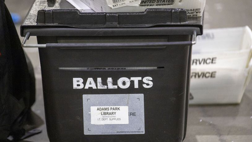 A box of mail-in ballots in Fulton County submitted for the 2020 primary election. (ALYSSA POINTER / ALYSSA.POINTER@AJC.COM)