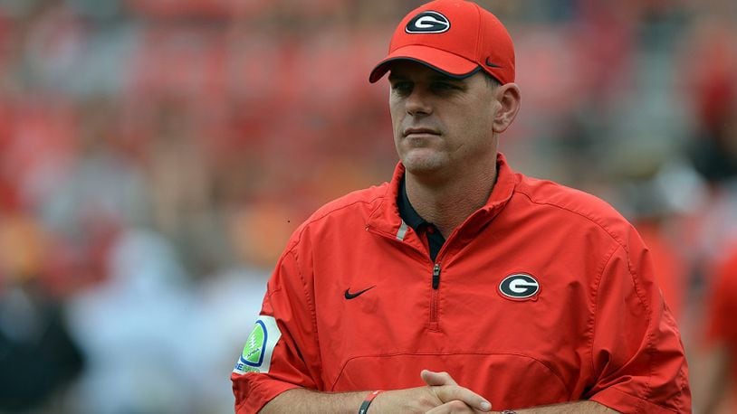 Former Georgia quarterback and later offensive coordinator Mike Bobo. Although Bobo left to accept a head coaching job at Colorado State in 2014, he’s now back with the Bulldogs, named a quality control analyst in January. (BRANT SANDERLIN / AJC file)