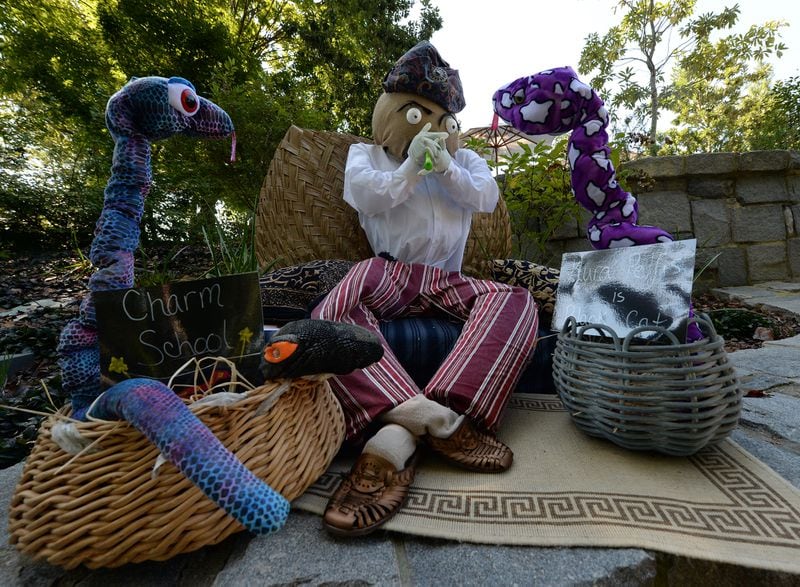 Throughout October, visitors head to the Atlanta Botanical Garden to enjoy about 100 of the wildest and wackiest scarecrows handcrafted by businesses, schools, individuals and organizations across the city. AJC FILE PHOTO / 2013