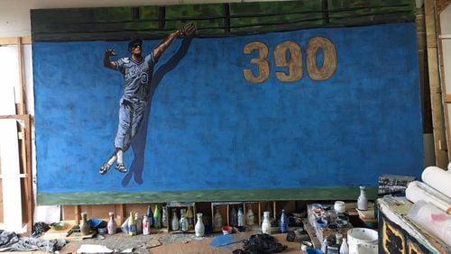 This is one of the largest of the 300 pieces of art that will be displayed at SunTrust Park. It's by John Robertson of Malibu, California, depicting Dale Murphy leaping to rob a home run.
