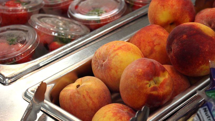 Parkview High School serves peaches that were locally sourced on Tuesday, Aug. 28, 2018. The cafeteria has one to two deliveries of fresh produce a week to provide a variety of fresh fruits and vegetables, says Karen Hallford, the assistant director of the Gwinnett County school nutrition program.JENNA EASON / Jenna.Eason@coxinc.com