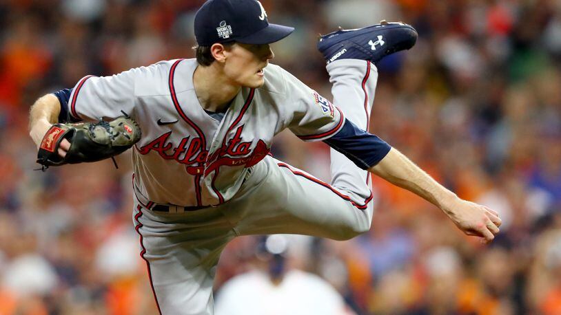 11/2/21 - Houston, Tx. - Atlanta Braves starting pitcher Max Fried delivers to a Houston Astros batter during the first inning in game 6 of the World Series at Minute Maid Park, Tuesday, November 2, 2021, in Houston, Tx. Curtis Compton / curtis.compton@ajc.com