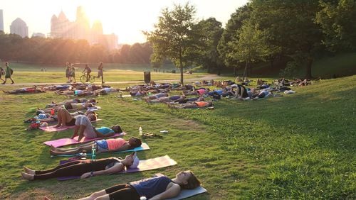 Westside Yoga hosts a free yoga session in Piedmont Park once a month.